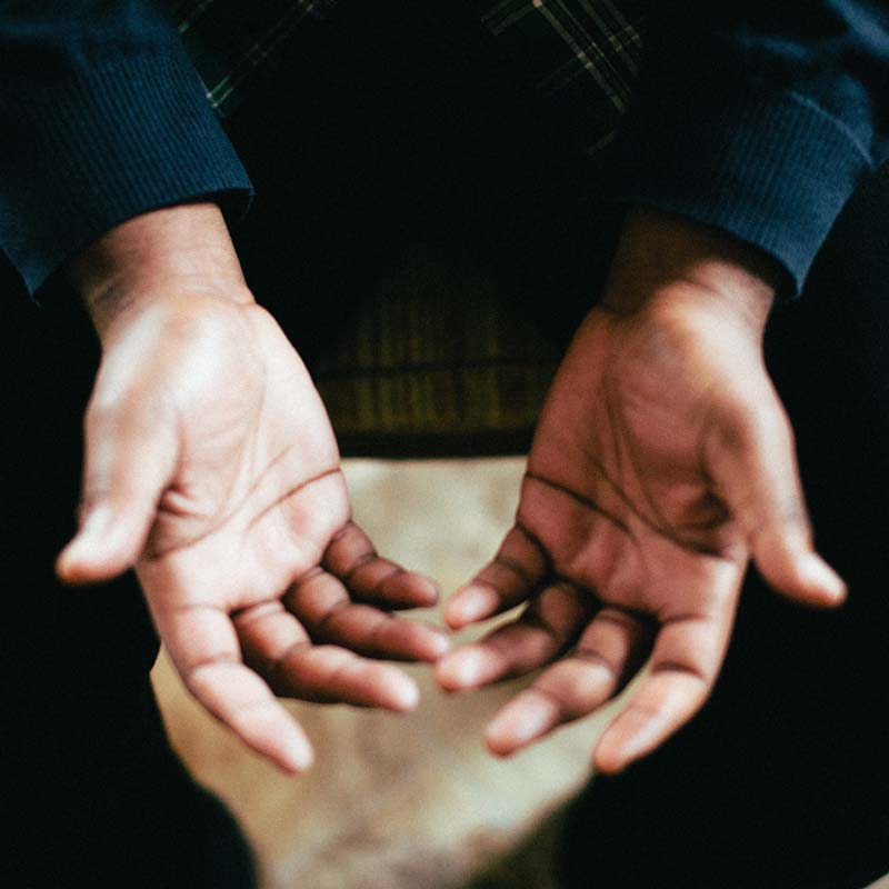 image of hands opened in prayer